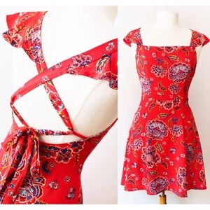 Floral flutter sleeve and bow back mini dress